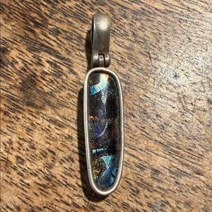Iridescent Pendant with Sterling Silver Frame This is a dichroic glass pendant